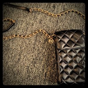 Micheal Kors cross body purse